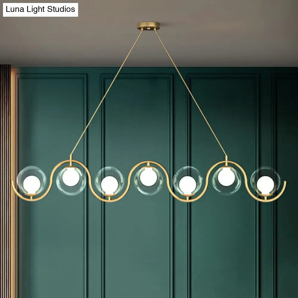 ديكوربايتس™ - وحدة إضاءة جزيرة بتصميم ما بعد الحداثة: مصباح معلق معدني متموج مع غطاء زجاجي