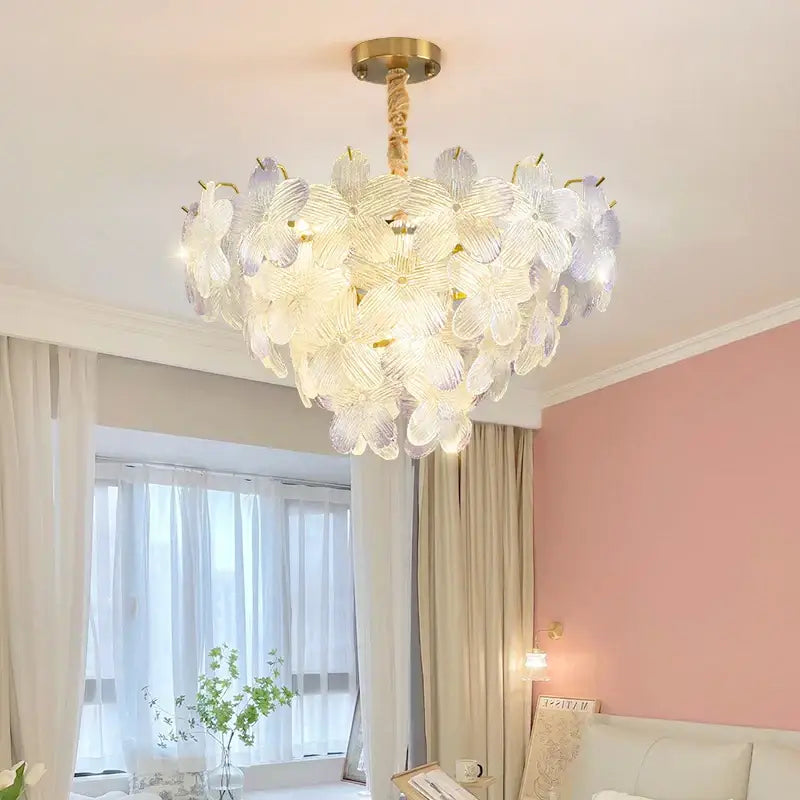 A delicate postmodern pendant light with translucent lavender and white glass flower princess shades for bedroom use