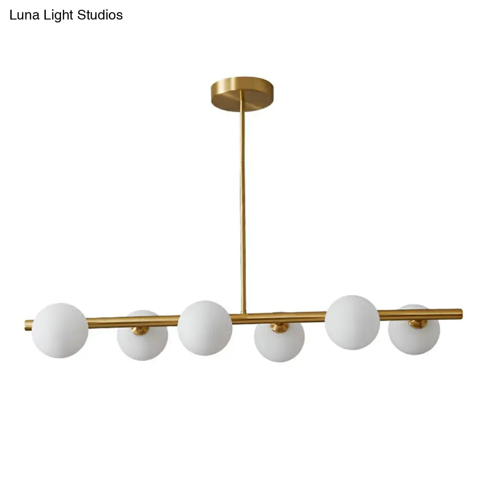 Lámpara de isla lineal posmoderna DecorBites™ - Lámpara colgante de cristal con detalles en latón para comedor