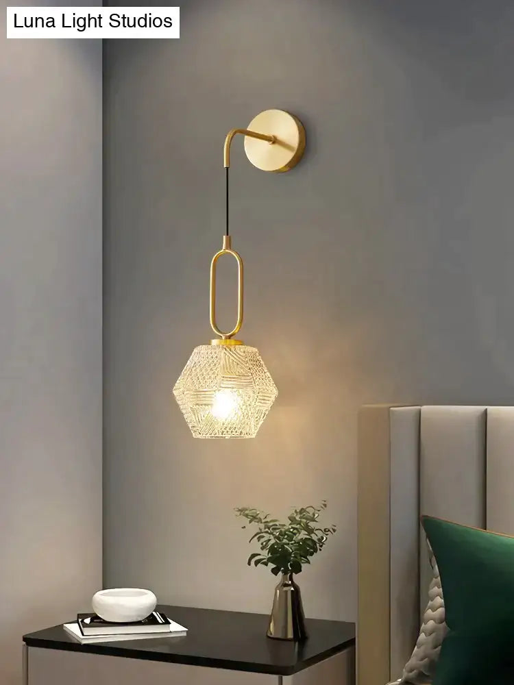 Gold-toned postmodern luxury led wall lamp with geometric woven glass shade ideal for bedroom lighting