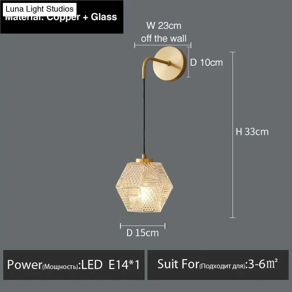 A hexagonal postmodern luxury led wall lamp with copper frame and etched glass diffuser for bedroom lighting