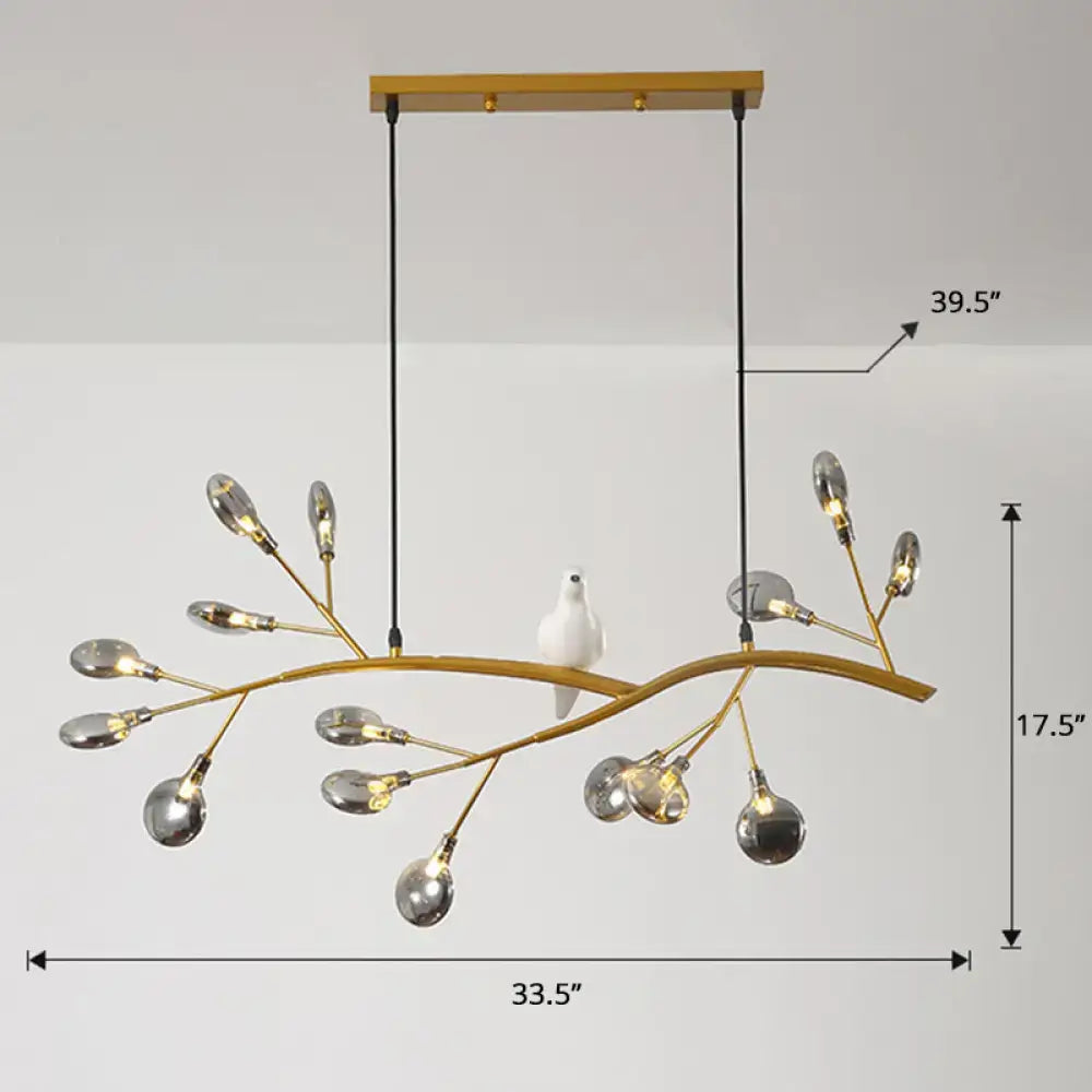 Gold-toned postmodern metal island light with branch-style design and clear frosted glass globe bulbs hanging lamp