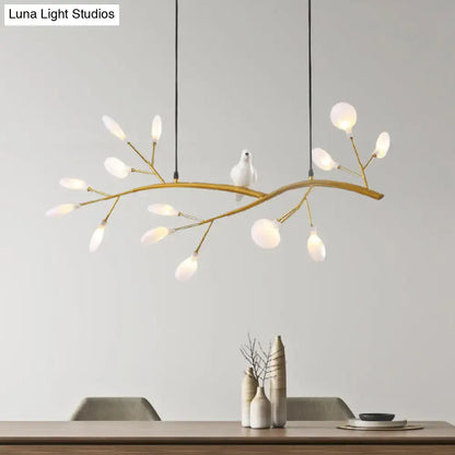 Gold-toned postmodern metal island light with frosted glass bulbs and white ceramic bird hanging lamp for restaurants