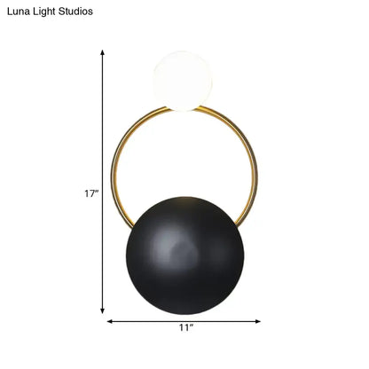 Postmodern orbital flush mount wall sconce with gold circular frame and black and white orbs for bedroom lighting