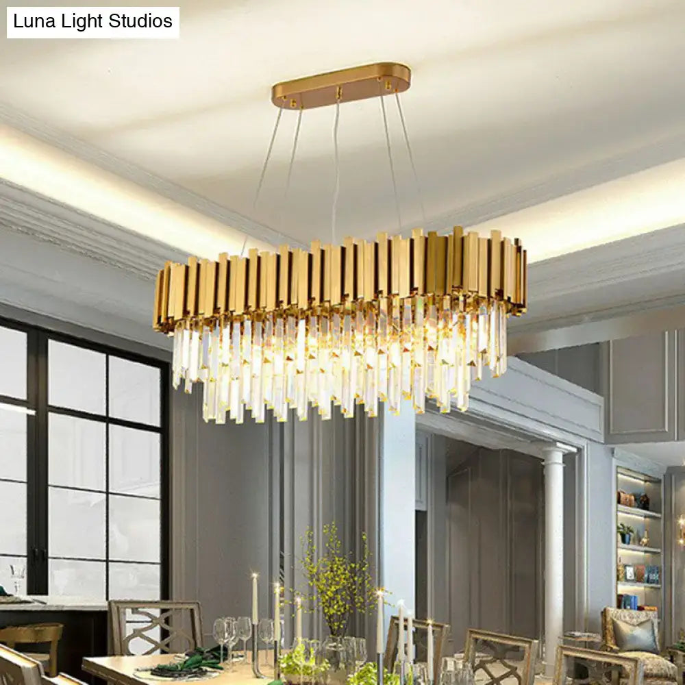 Gold-toned decorbites postmodern oval hanging light with vertical brass bars and clear crystal prisms for dining room island