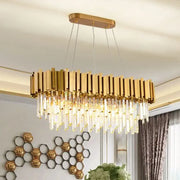 Decorbites gold postmodern oval hanging light with rectangular gold-toned frame and cascading crystal prisms