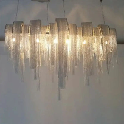 Decorbites postmodern silver lobby chandelier features an arch aluminum chain with cascading glass prisms and 220v-240v 110v-120v compatibility
