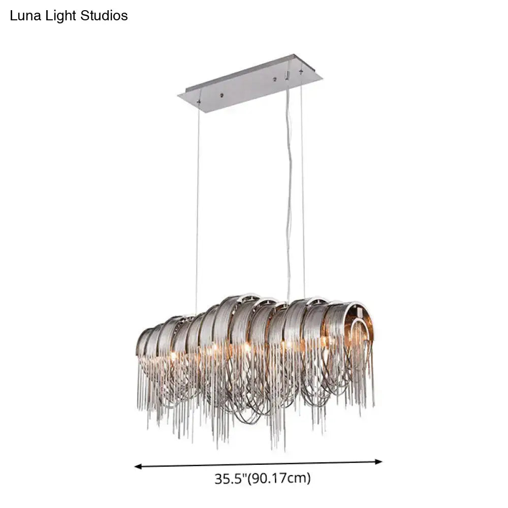 Modern chrome-finished DecorBites™ postmodern silver lobby chandelier with arch aluminum chain and 12-bulb suspension light