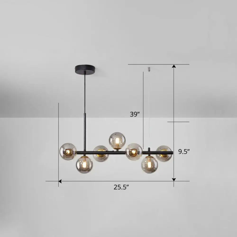 Black metal DecorBites™ LED island pendant light with seven smoke grey cognac glass globes for dining room