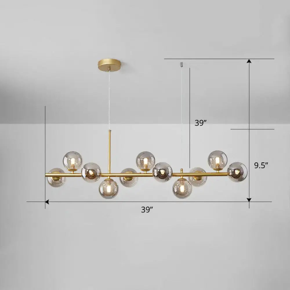 Gold-toned DecorBites™ LED island pendant light with clear smoke grey glass bubbles for dining room illumination