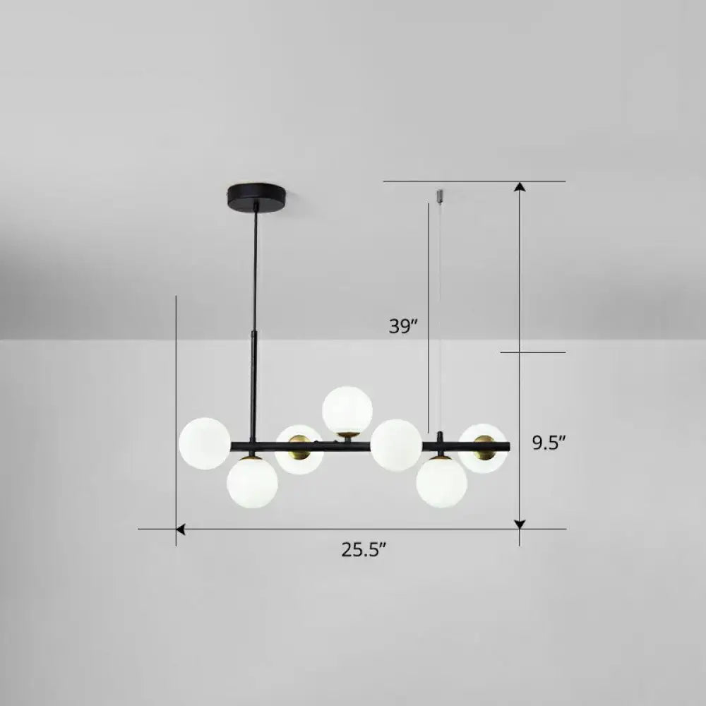 Modern black metal chandelier with six frosted glass globe lights in smoke grey cognac for dining room lighting