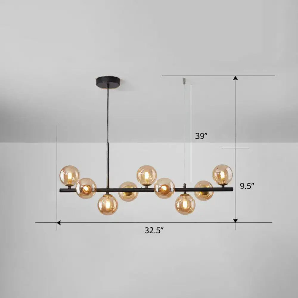 Modern black metal chandelier with seven smoke grey cognac amber glass globe bulbs for dining room lighting