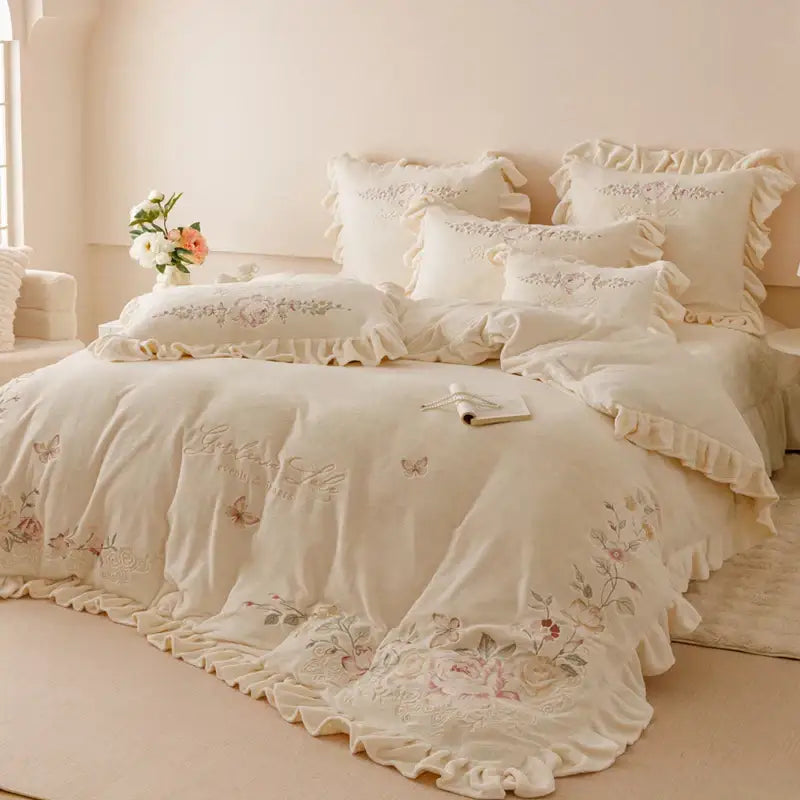 Cream-colored bedding set with delicate flowers embroidery ruffles and ruffled edges for elegant bedroom decor