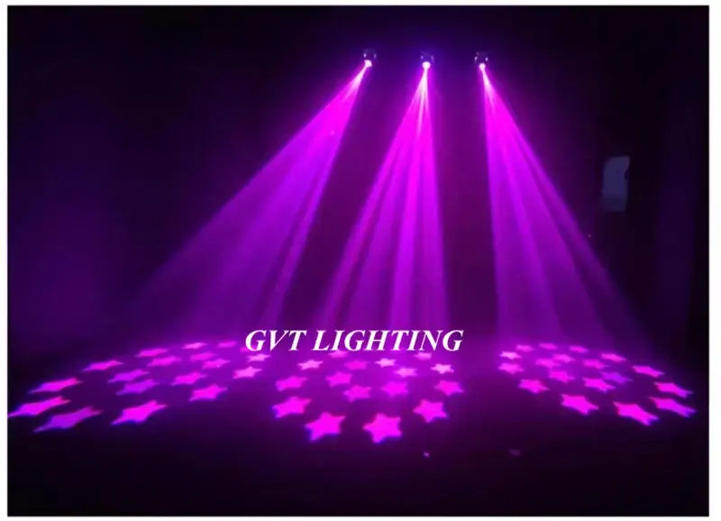 Purple star-shaped light projection on dark floor created by three spotlights from decorbites 120w led beam spot light