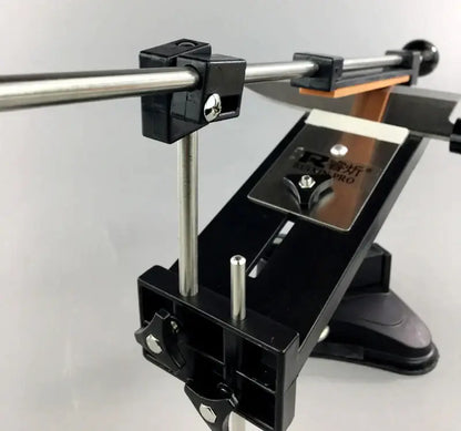 Professional black and silver decorbites knife sharpener with stone bars grinders, adjustable clamps, and orange abrasive strip