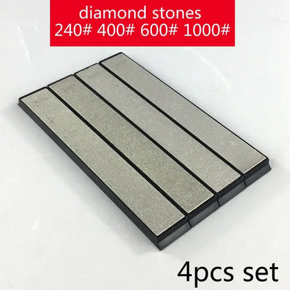 Set of four gray abrasive stone bars grinders with black edges for professional decorbites knife sharpener kitchen tool