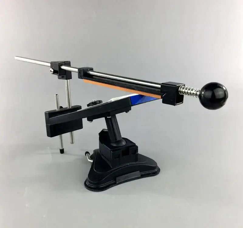 Professional black and silver decorbites knife sharpener with blue and orange stone bars grinders and adjustable tension knob
