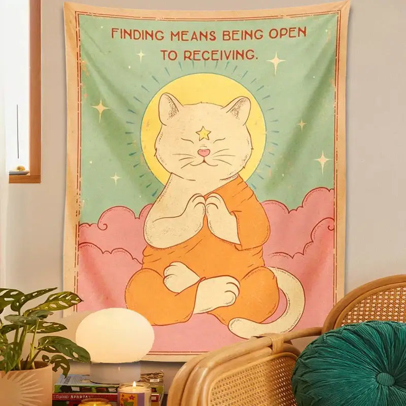 Decorbites cat tapestry sun featuring pastel green and pink hues with meditating orange cat and tapestry sun moon theme decor