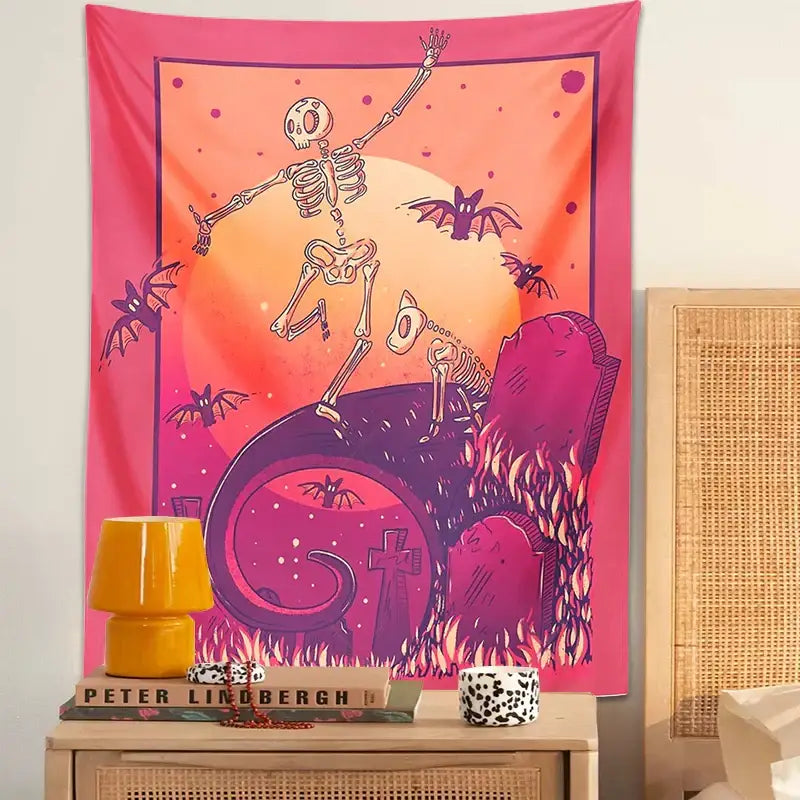 Vibrant pink and orange skeleton psychedelic tapestry with dancing skeleton purple bats and tombstones for wall decor