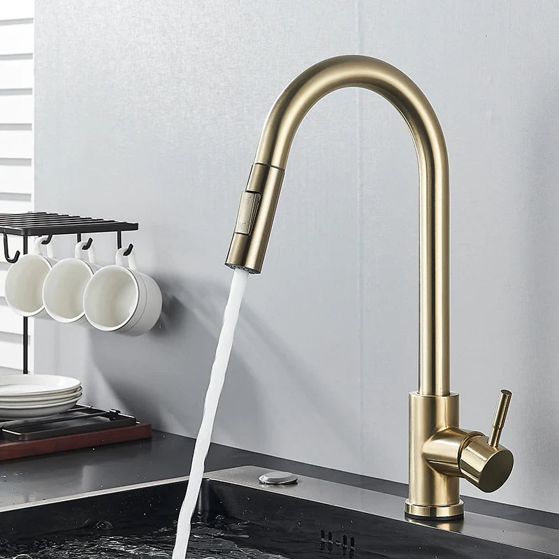 Gold-toned pull out kitchen faucet with curved spout single lever mixer tap for hot water with 360 rotation and single hole design