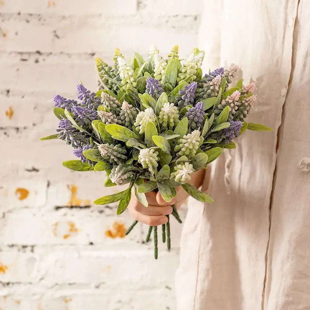 A delicate green plants bouquet of purple and white lavender fake green plants for wedding decor