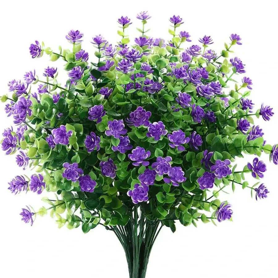 A decorbites artificial eucalyptus plant with vibrant purple blossoms and glossy green leaves for wedding decor