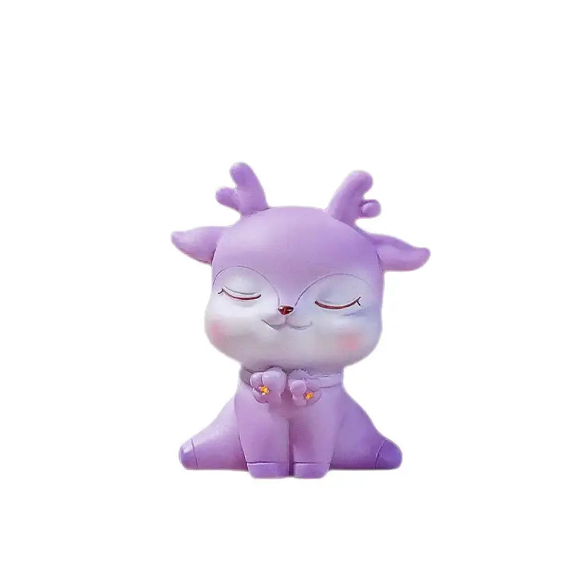 A cute lavender cartoon sika deer resin figurine with closed eyes rosy cheeks and golden star accents for bedroom decor