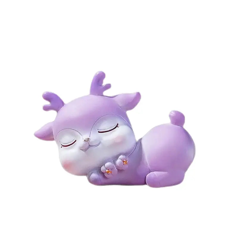 A plush lavender cartoon sika deer resin ornament with closed eyes and tiny antlers for bedroom decor