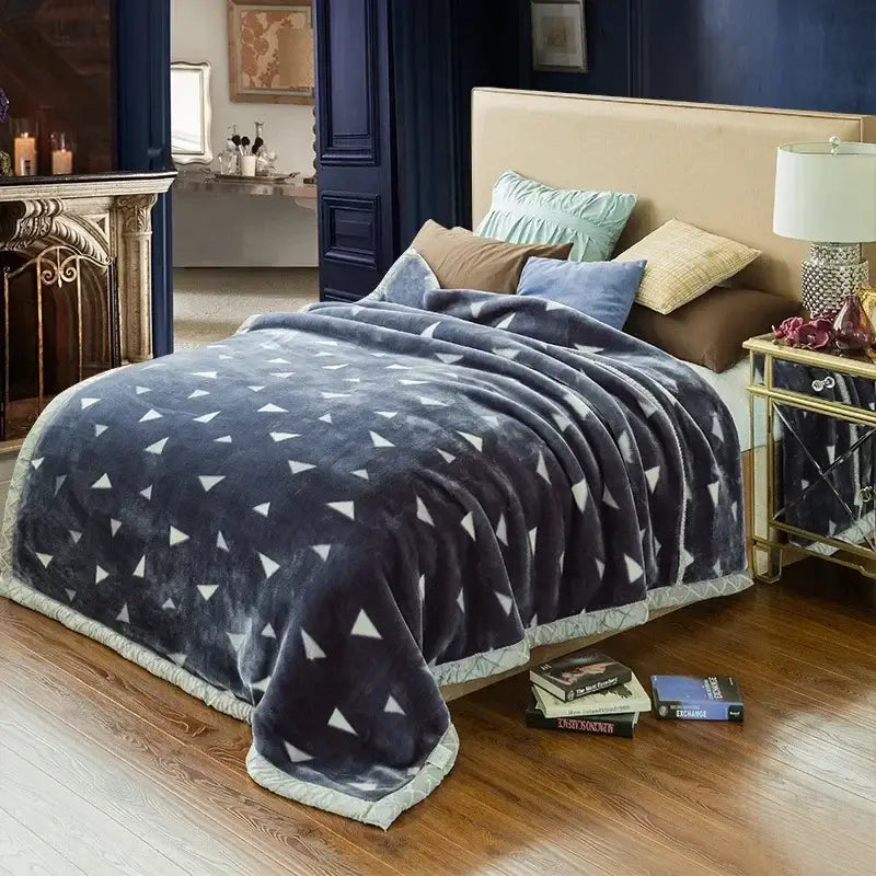 Dark gray plush double layer raschel blanket with white triangular patterns and light fringe border for bedroom throw