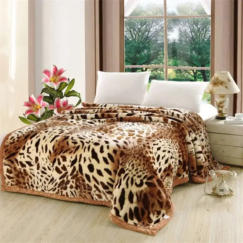 A plush leopard-print purple and cream double layer raschel blanket with soft fluffy texture for bedroom throw