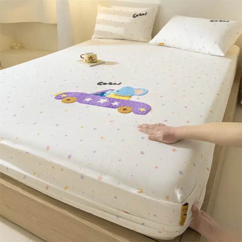 White cotton fitted sheet with purple and blue decorbites cartoon embroidered car design and yellow wheels