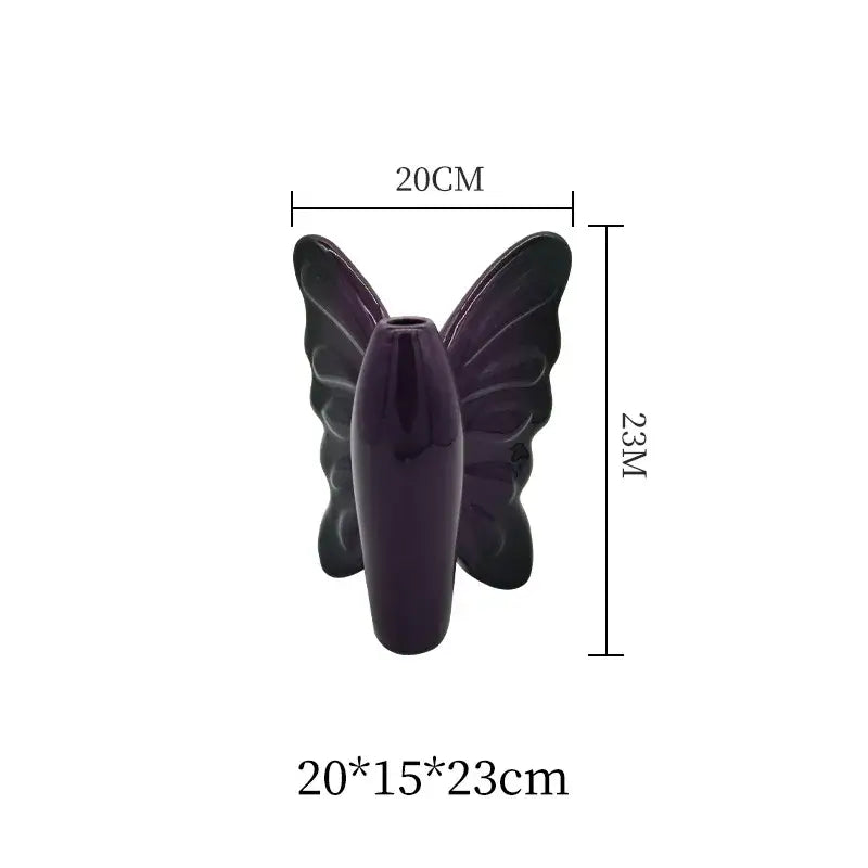 A glossy dark purple butterfly ceramic vase with detailed wing patterns for living room decor by decorbites dark butterfly