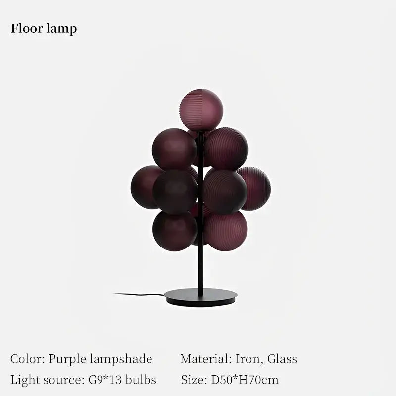 Purple glass globe floor lamp with black iron stand featured in decorbites grape chandelier modern living room light