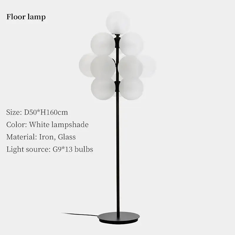 Modern floor lamp with black iron stand and white glass globes from decorbites grape chandelier collection for living room