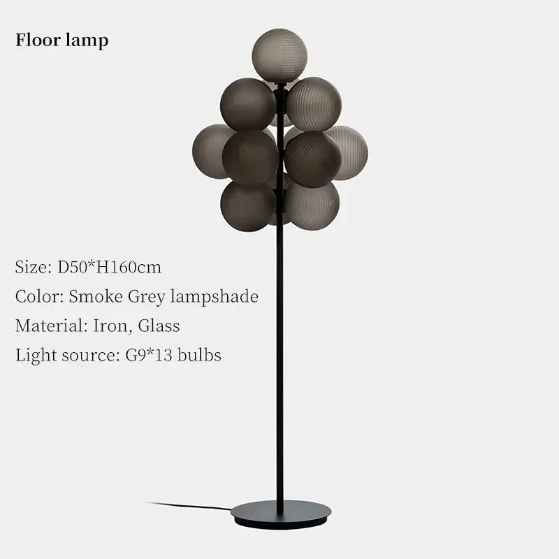 Smoke grey glass globe floor lamp with sleek black iron stand for modern living room by decorbites grape chandelier