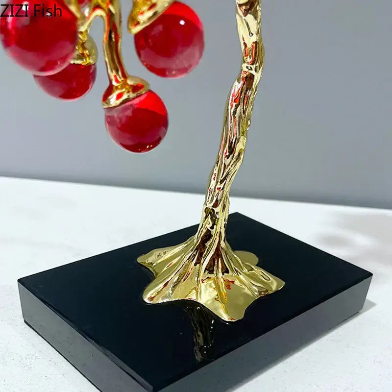 Golden crystal grape tree sculpture with glossy red glass cherries on black base for decorbites grape tree ornaments