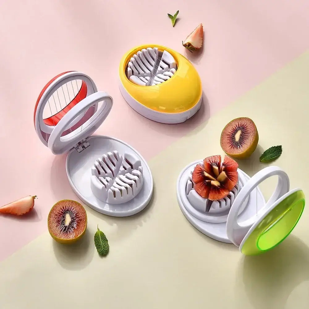 Brightly colored compact egg cutter slicer with white base and vibrant yellow or green lid featuring purple rotating blade