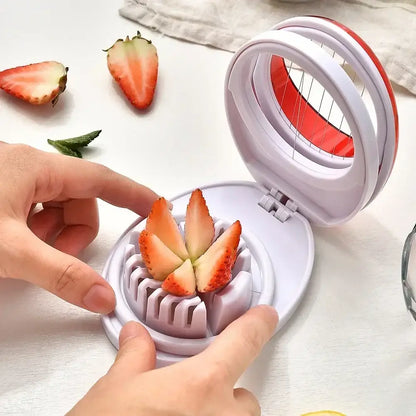 Purple rotating blade egg cutter slicer with white and red circular design and multiple blades for even slicing