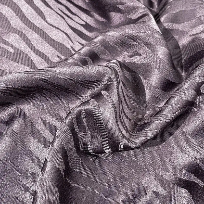 Purple zebra print satin duvet cover set with shimmering gray fabric and metallic sheen for luxury bedroom use