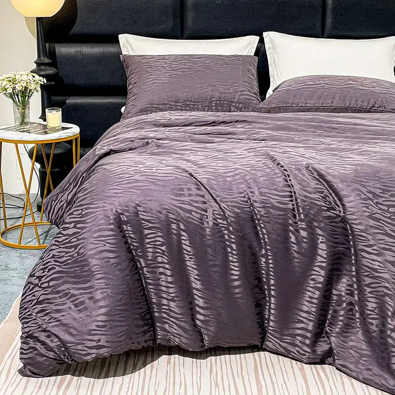 Purple zebra print satin duvet cover set featuring luxury quilt kit for elegant bedroom decor and comfort