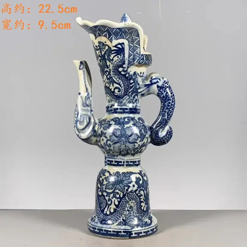 Qing blue and white porcelain ewer with intricate white dragon pattern for living room decor