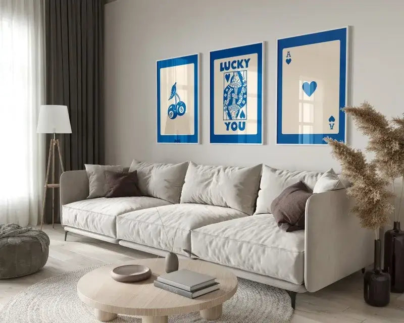 Beige sectional sofa with soft cushioned seating and dark brown throw pillows beside decorbites™ 3-piece retro hearts wall art set