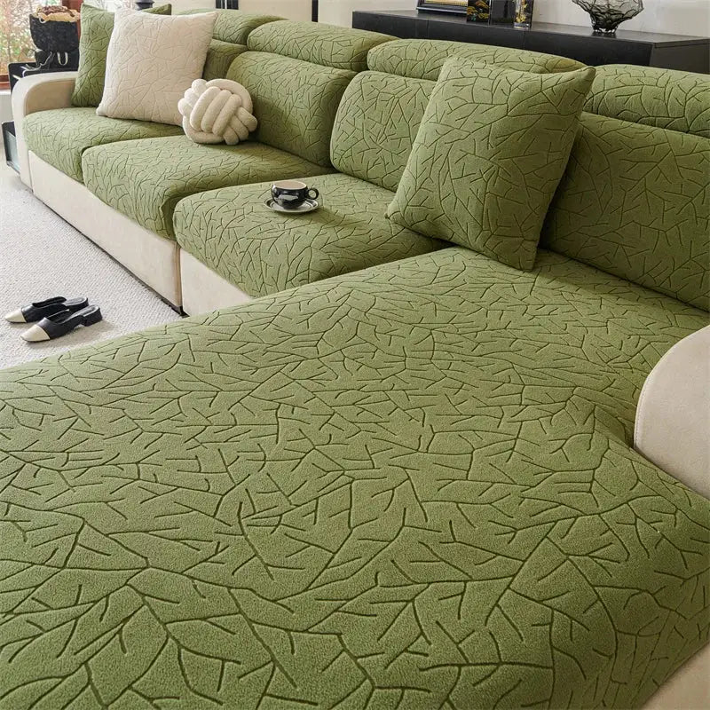 Olive green quilted leaf pattern elastic fabric sofa cover designed for living room use
