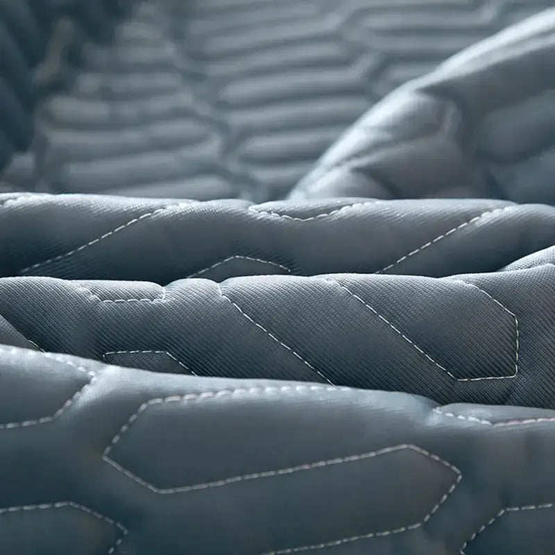 Dark gray quilted latex fitted sheet set with white hexagonal stitching for cooling mattress protection