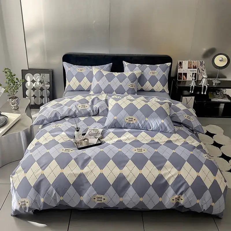 Quilted cream and black geometric printed bed set with blue and cream argyle patterned bedding featuring good look labels