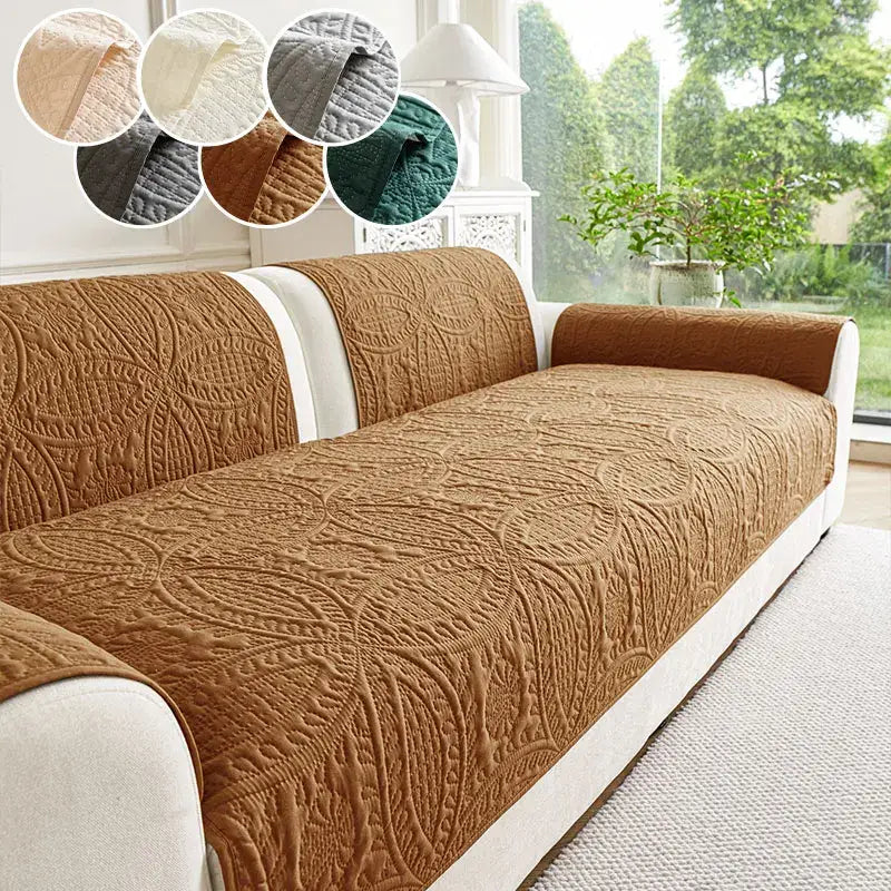 Brown quilted sofa cover with intricate leaf-patterned embroidery for living room cushions and decor