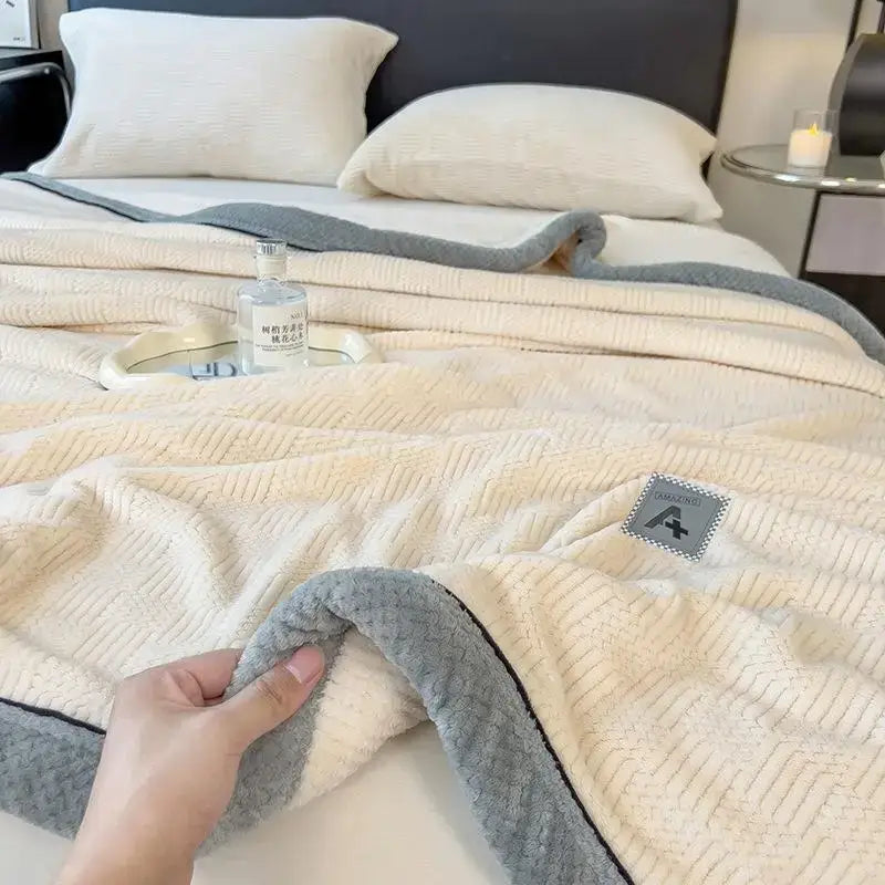 Cream-colored plush blanket with textured ribbed pattern and gray fleece border by DecorBites cozy cotton velvet