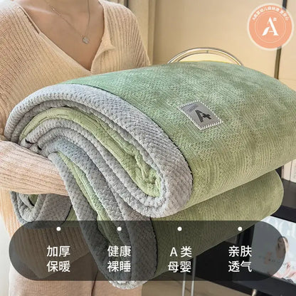 Quilted cream and gray plush blanket with textured green and gray fleece surface from decorbites cozy cotton velvet collection