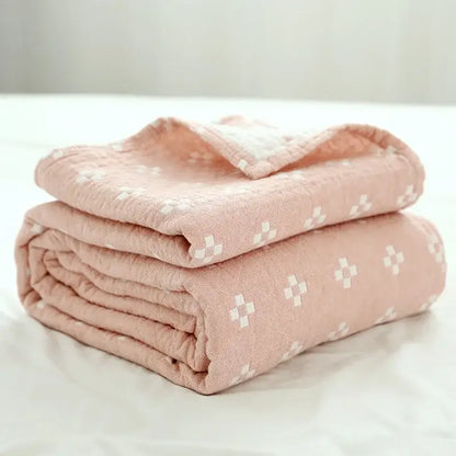 Soft pink quilted decorbites cotton summer blanket with subtle white crosshatch pattern for bedroom decor
