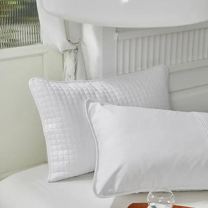 White quilted decorbites cotton pillowcase with diamond-stitched pattern and soft plush fabric for bedroom decor